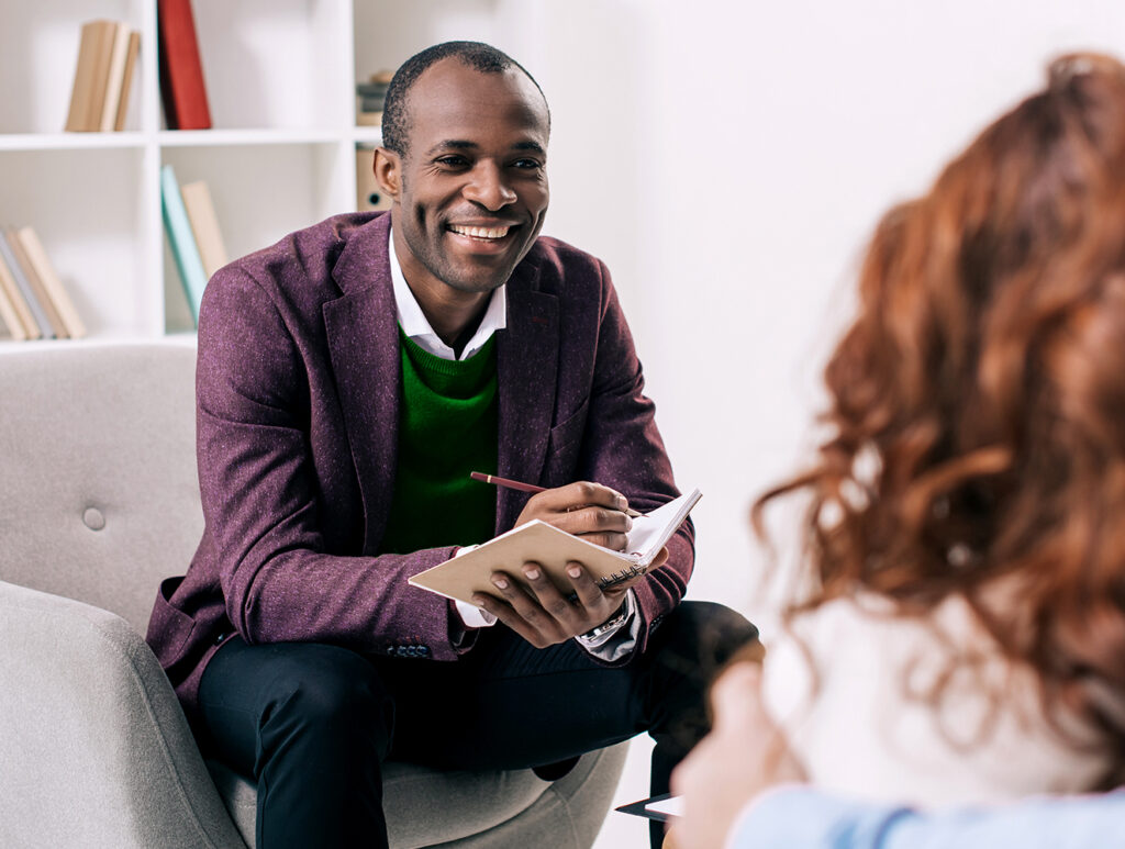 Male therapist with client